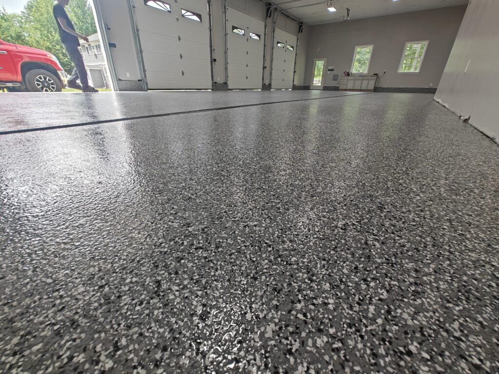 Epoxy Concrete Coating 2160 sq ft of wombat flake in Mandeville LA-min